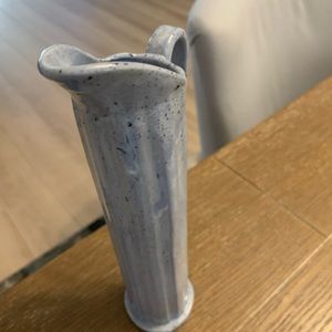 Tall/Thin Light Blue Ribbed Vase with Speckles.  Long curvy handle  10 3/4” tall